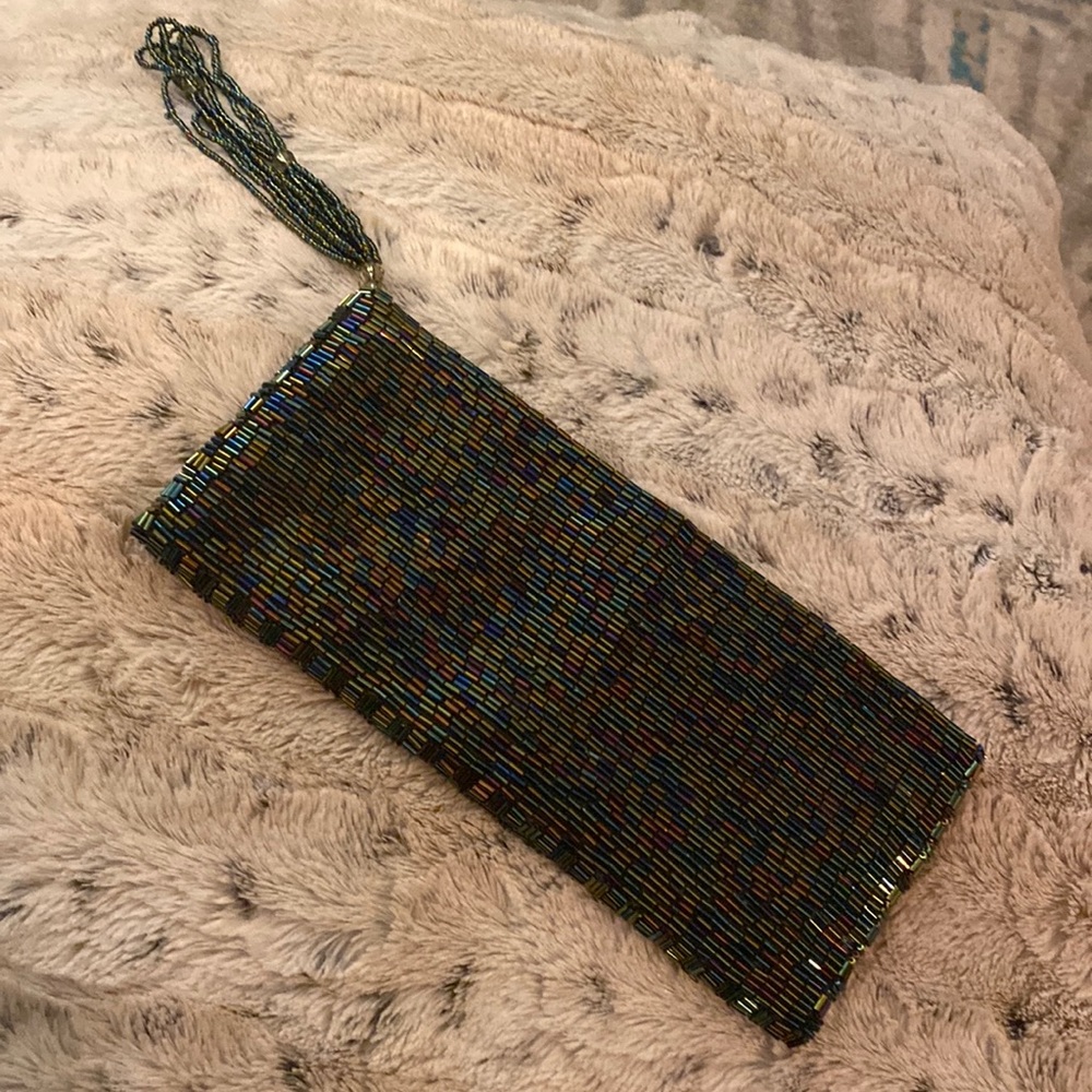 Beautiful solid beaded Bebe Wristlet